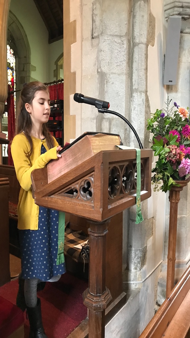 Head Girl reading at the Family Service.